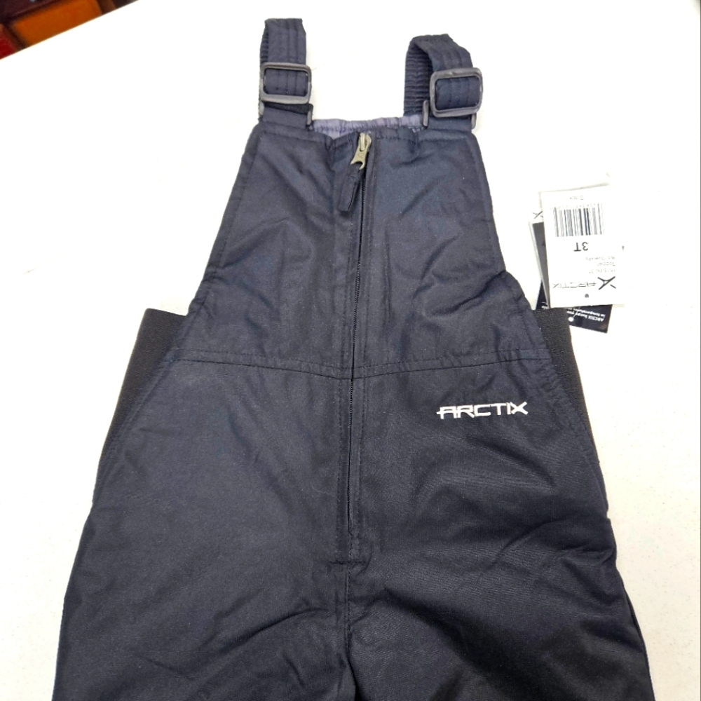 NWT black Bible snowpants for children.